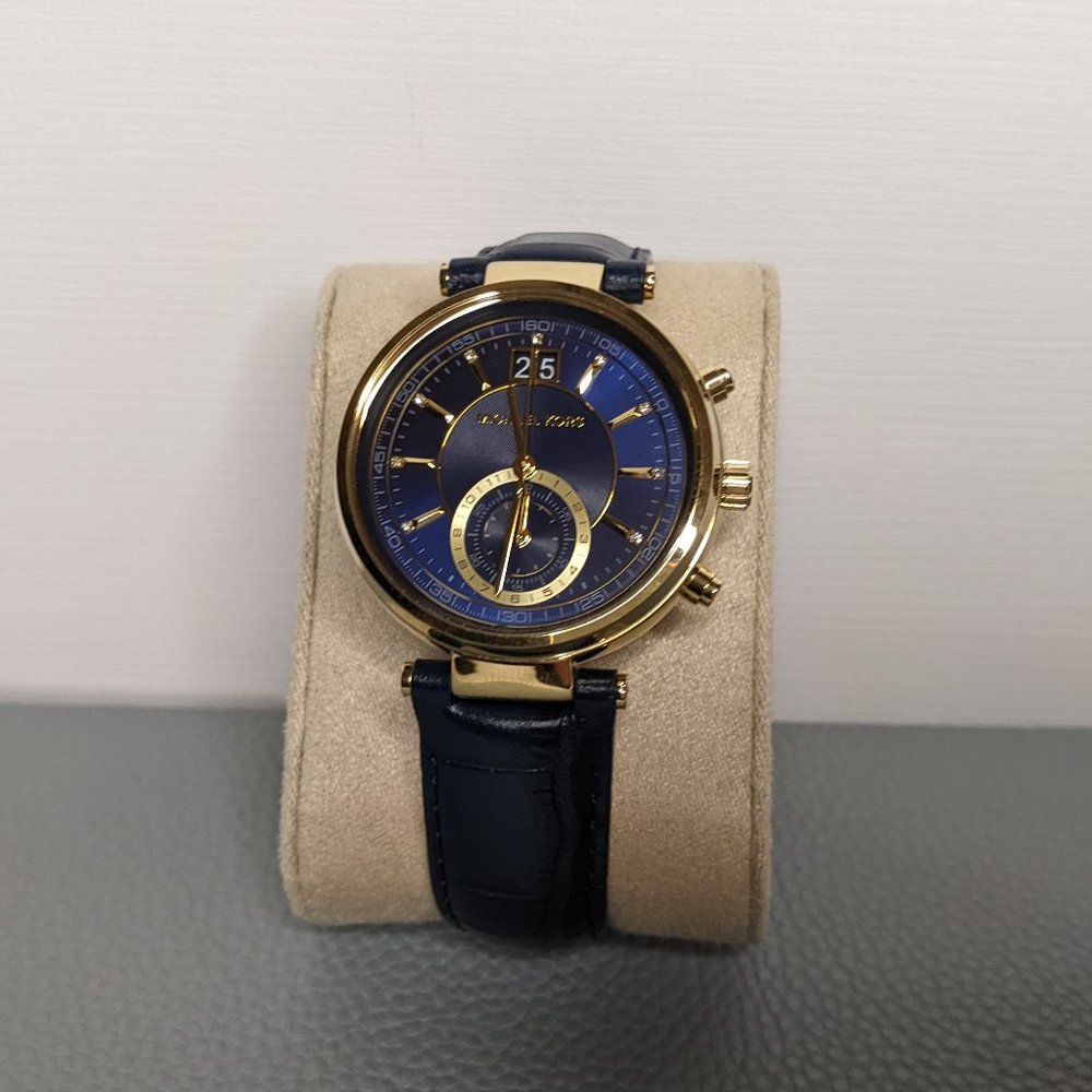 Michael Kors Women's Swiss Chrono watch with Royal Blue Leather Embossed…